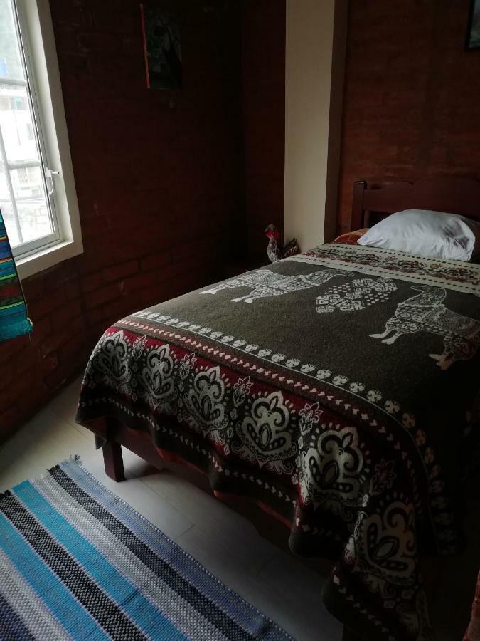 Hostal La Casa Amarilla City Baños Εξωτερικό φωτογραφία